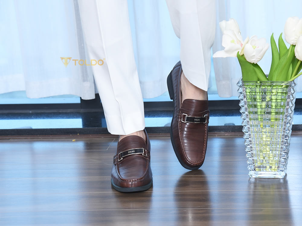 Giày cao 7cm đế khâu da thật
